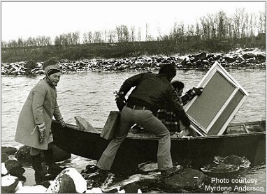 Bier Ante Ris'ten (left); Ronald Davis (center) with paint box and portable easel; and Stanley Roseman (right) with his canvases as they prepare to cross a river in a rowboat in Lappland, 1976. Photo courtesy of Myrdene Anderson.
